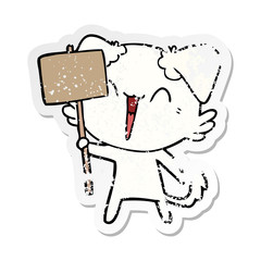 distressed sticker of a happy little cartoon dog holding sign