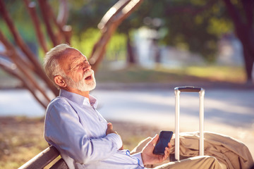 Health elderly concept Senior men cardiac arrest heart attack in park Severe heartache