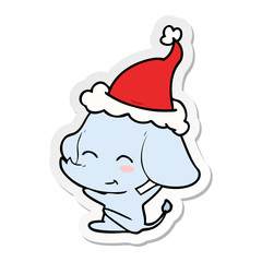 cute sticker cartoon of a elephant wearing santa hat