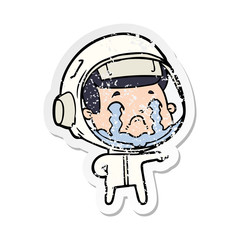 distressed sticker of a cartoon crying astronaut