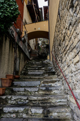 Fototapeta na wymiar Italy, Varenna, Lake Como, a close up of a stone staircase