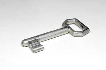 Old metal key isolated