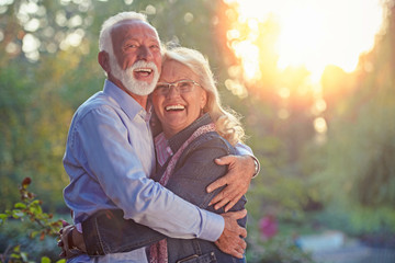 Happy senior couple in love. Park outdoors.