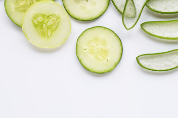 Aloe vera and cucumbers isolated on white.