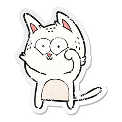 distressed sticker of a cartoon cat being cute