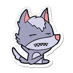 sticker of a cartoon wolf showing teeth