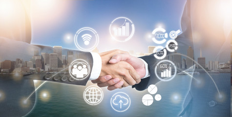 Double exposure of shaking hand business people for success deal on modern city with new icon