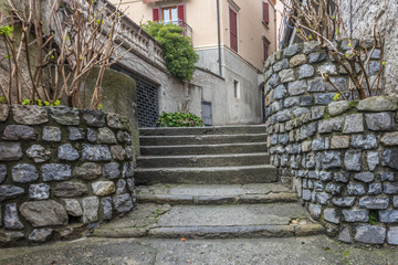 Italy, Varenna, Lake Como, a stone wall with steps