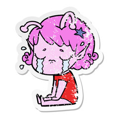 distressed sticker of a cartoon crying alien girl