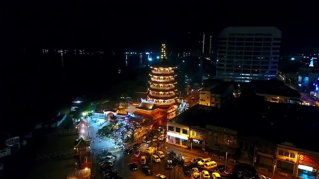 Top Night View of a Chinese Temple In Kota Kinabalu - Malaysia - Aerial - Left Dolly 