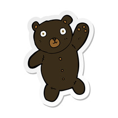 sticker of a cartoon cute black teddy bear