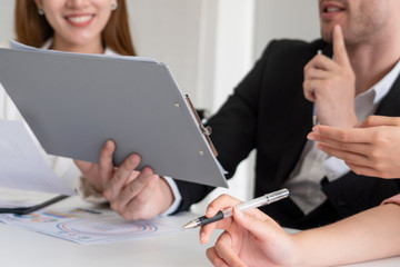 Businessman is in meeting discussion with colleague businesswomen in modern workplace office....