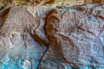 Ancient inscriptions at Khazali siq at Wadi Rum desert in jordan