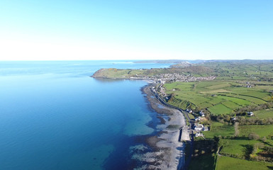 Fototapeta na wymiar Ballygally Co Antrim Northern Ireland sunny day sea sand