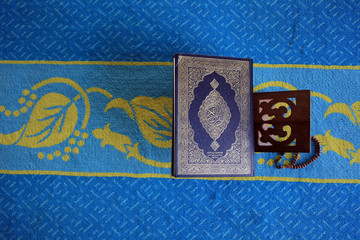The holy Quran on mosque background