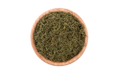 dill in wooden bowl isolated on white background. Spices and food ingredients.