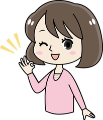 OKサインをする若いかわいい女性/女の子