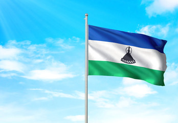 Lesotho flag waving sky background 3D illustration