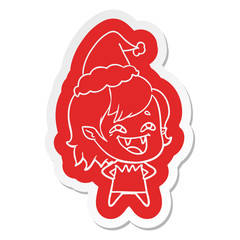 cartoon  sticker of a laughing vampire girl wearing santa hat