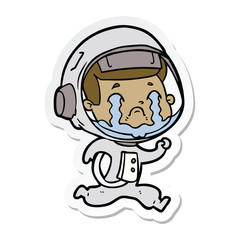 sticker of a cartoon crying astronaut