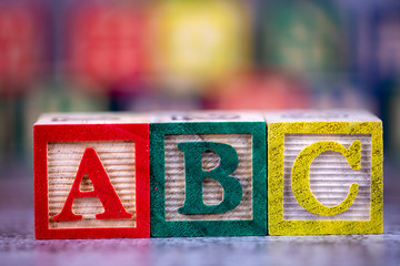 Colorful wooden alphabet; a, b, c write. Education concept photo.