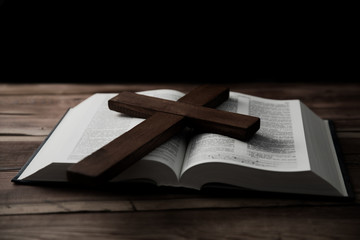 Cross on book