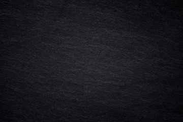 Dark grey black slate background or natural stone texture. © modify260