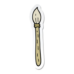 sticker of a cartoon paintbrush