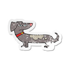 retro distressed sticker of a cartoon annoyed dog