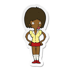 sticker of a cartoon woman with hands on hips