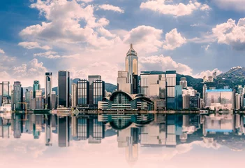 Foto op Plexiglas Hong Kong cityscape in the morning : View from Victoria Harbour with beautiful sunrise and reflection © nithid18
