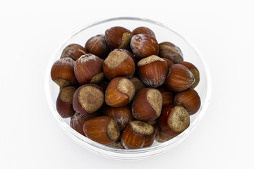 Hazelnuts in a glass bowl