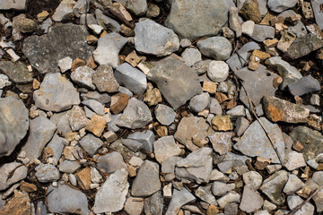 Close Up of Rocks and Pebbles on the Ground Filling the Frame