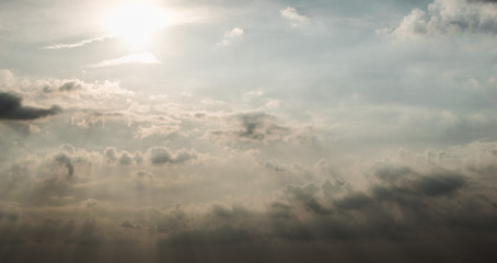 Golden Hour Sky with Sunrays Shining through the clouds