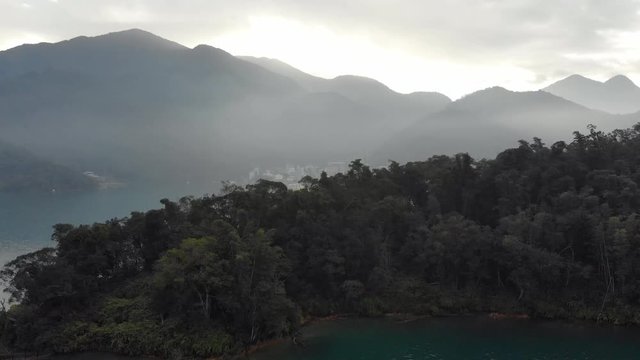 Arial drone shot of Sun Moon Lake and Ita Thao just before sunrise