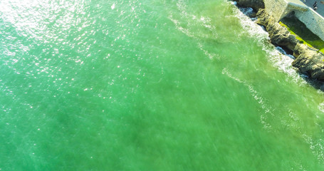 Aerial view of waves in the mediterranean sea. Sitges, Barcelona. Spain. Drone Photo