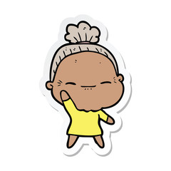 sticker of a cartoon peaceful old woman