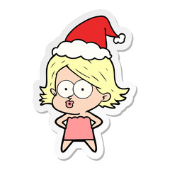sticker cartoon of a girl pouting wearing santa hat