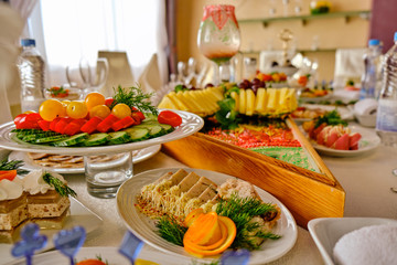 festive food on the table. A collage of different food in a restaurant. The concept of healthy eating and diet