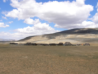 Ancient gravestones in the steppes of the Mongolia. Mongolian Cemetery