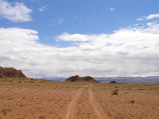 Mongolian natural landscapes surrounded by mountains and rocks.