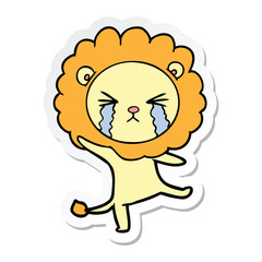 sticker of a cartoon crying lion