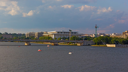 Potomac River waterfront panorama of Washington DC, USA. Water sport activities at sunset on the river.