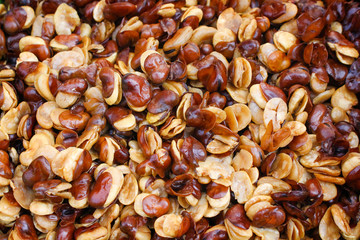 Top view tasty crispy  salted beans or fava beans texture on background ,  deep fried until golden