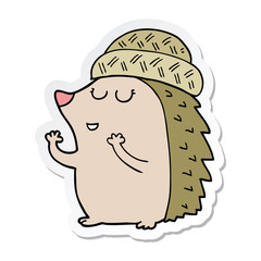 sticker of a cartoon hedgehog wearing hat