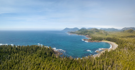 Beautiful aerial seascape view on the Pacific Ocean Coast during a vibrant summer day. Taken in Northern Vancouver Island, British Columbia, Canada.