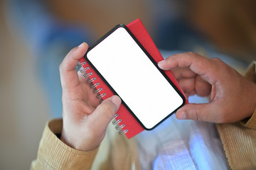 Male hand holding smartphone