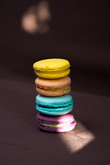 Stacked colourful macarons.