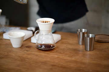 Coffee drip and accessories on the table