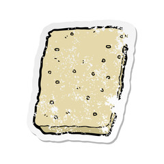 distressed sticker of a cartoon biscuit